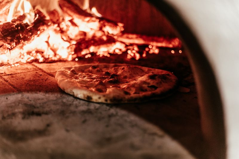 Inside Dewey's pizza restaurant in St. Louis — warm, welcoming dining atmosphere