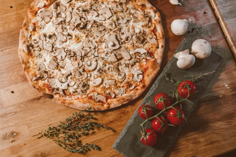 Truffle mushroom specialty pizza with wild mushrooms