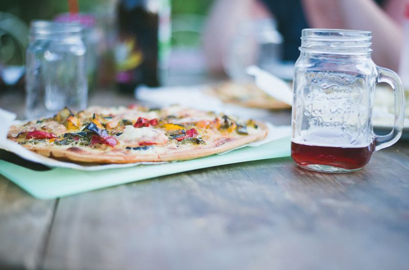 Guests enjoying a pizza making night event at Dewey's